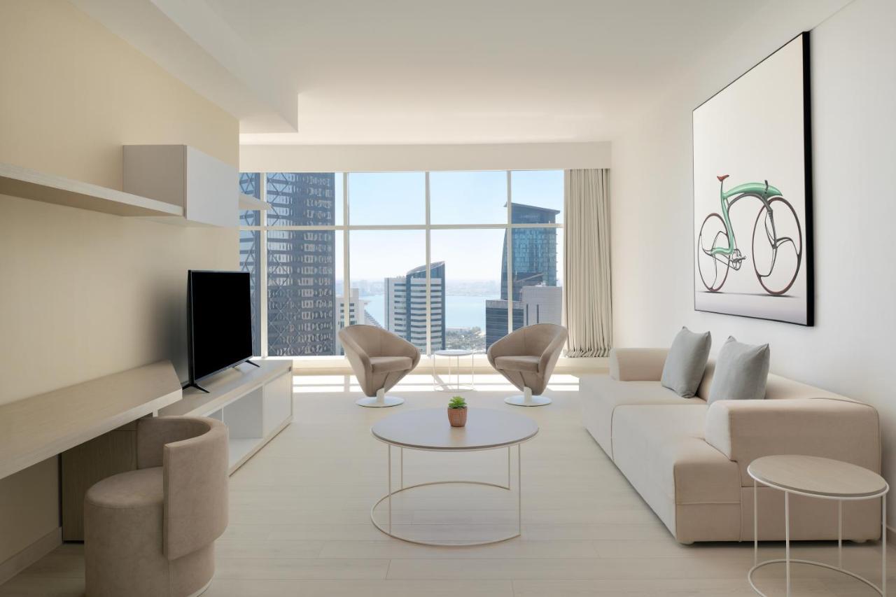 Element By Westin West Bay Doha Hotel Exterior photo A living room
