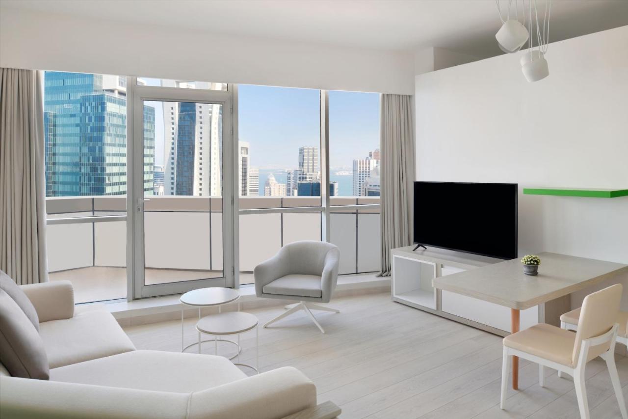 Element By Westin West Bay Doha Hotel Exterior photo A living room in a condominium