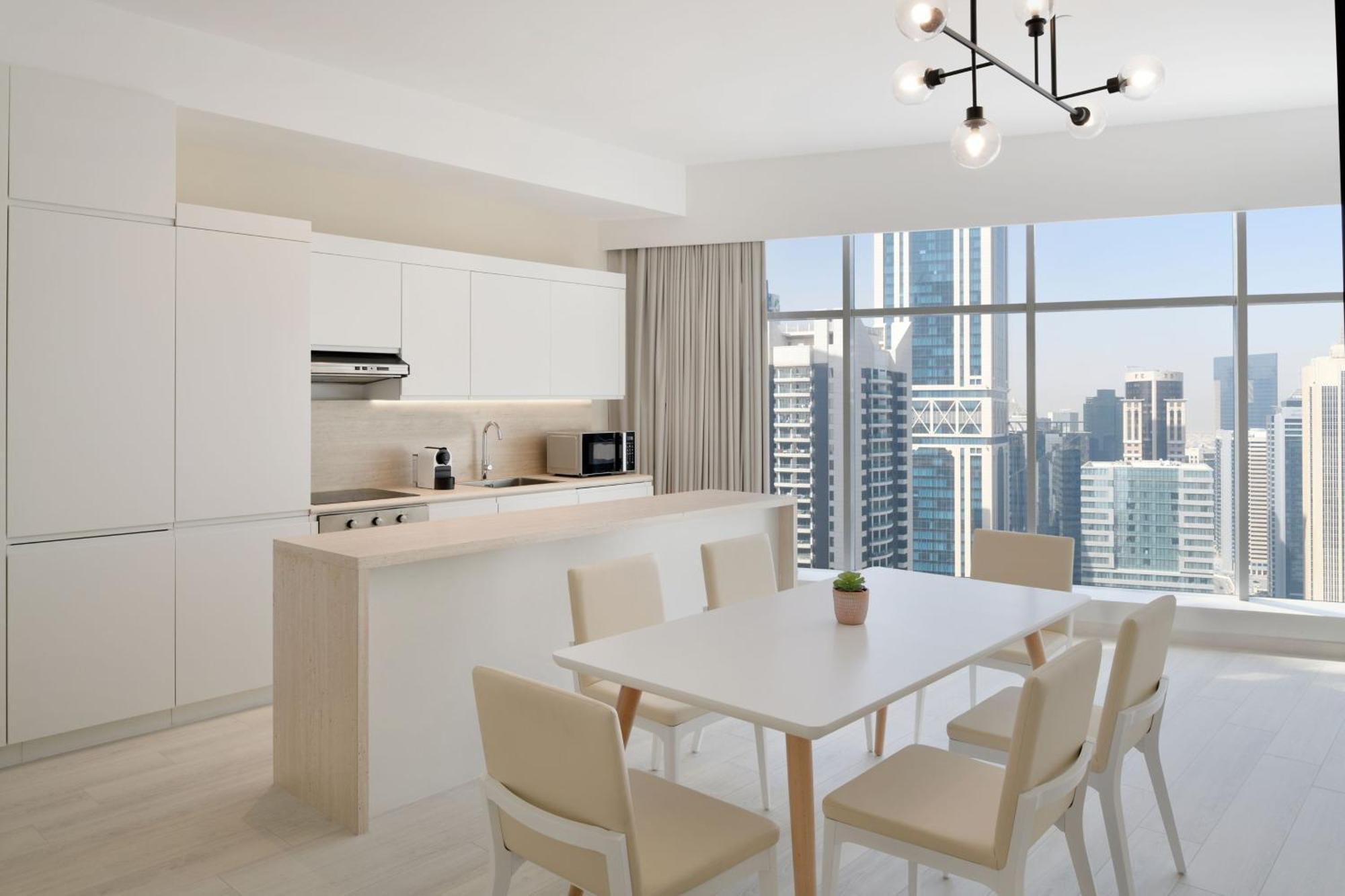 Element By Westin West Bay Doha Hotel Exterior photo A kitchen in a typical apartment