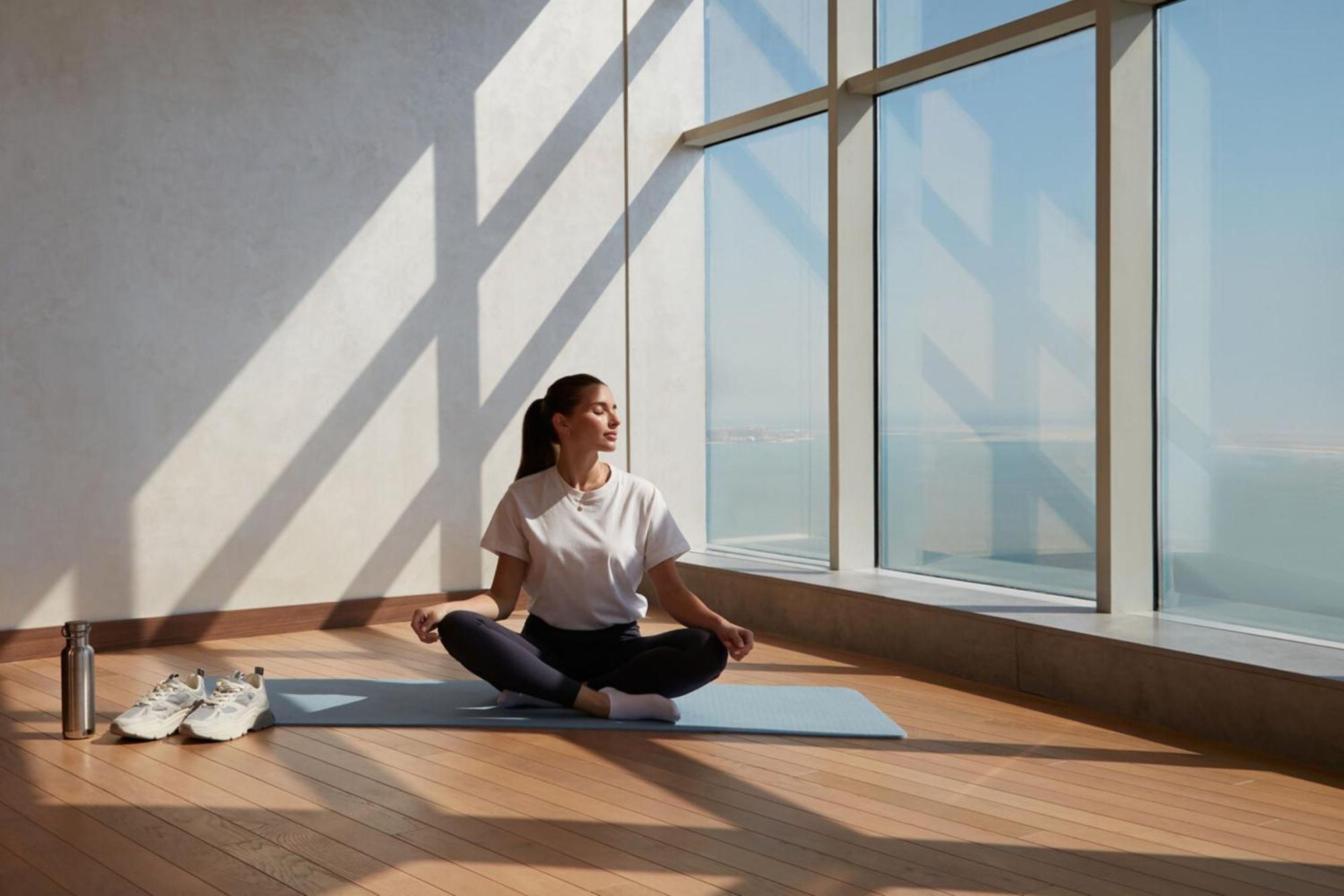 Element By Westin West Bay Doha Hotel Exterior photo A woman meditating